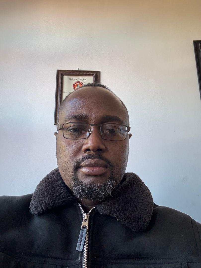 Dr. William Busumani